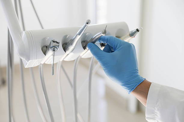 Professional Tooth Extraction technician working in Oak Island, NC